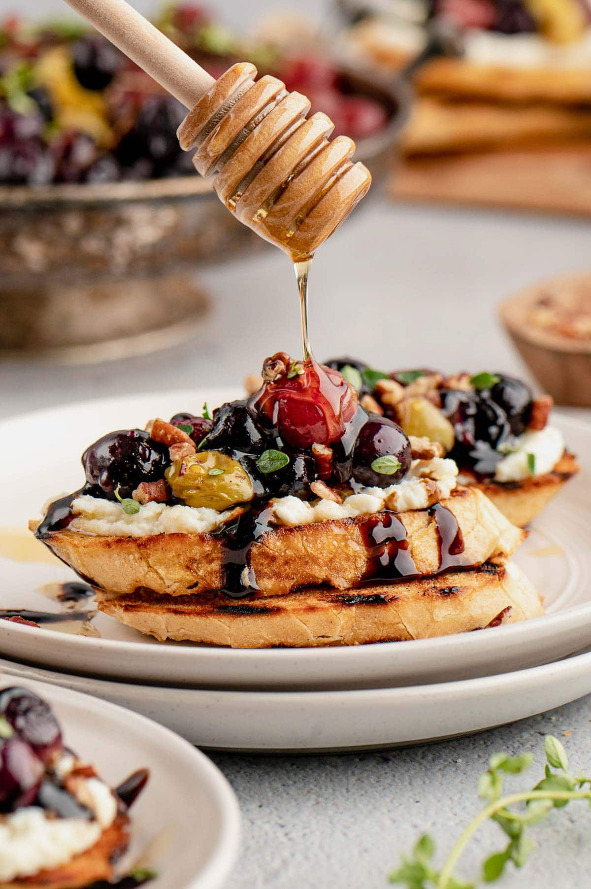 Roasted grapes on a crostini, with a honey drizzle.
