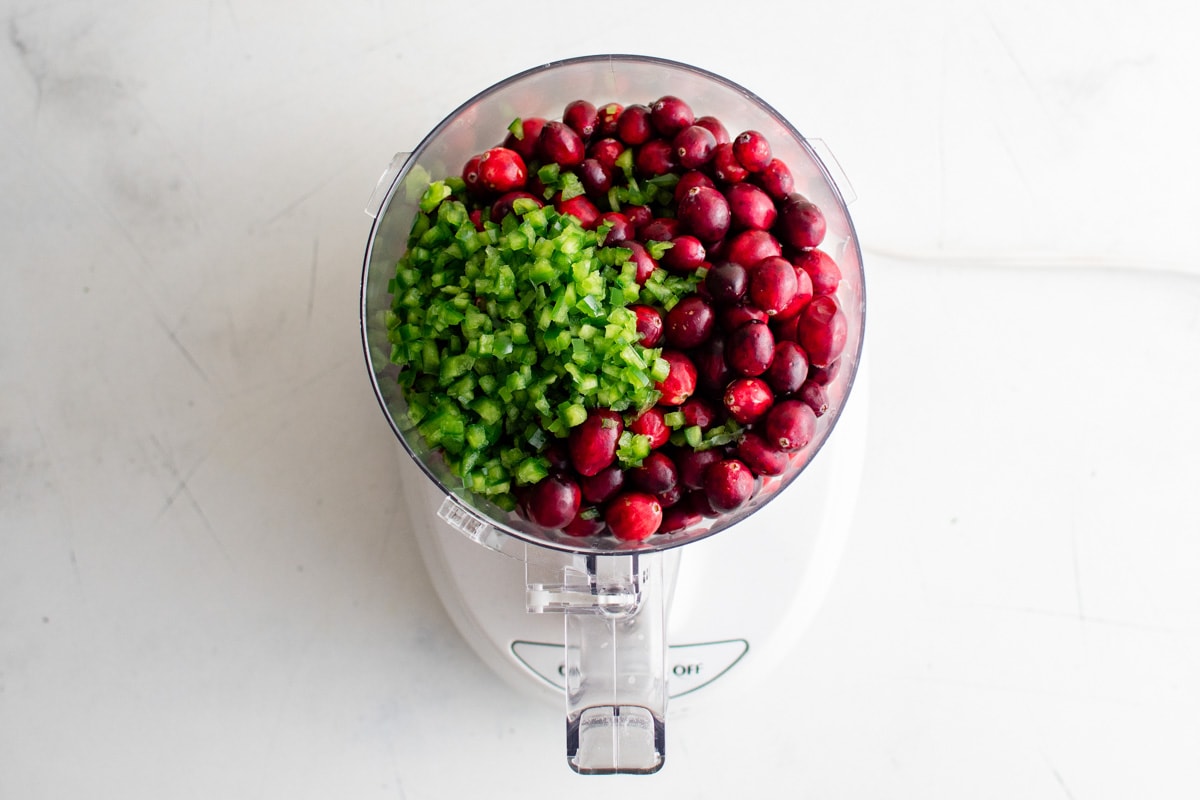 Cranberries and minced jalapenos in a food processor.