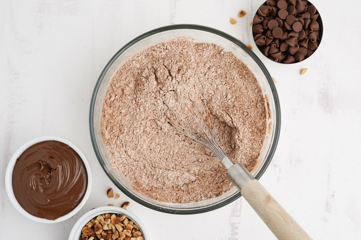 Cocoa powder and flour mixed together in a bowl.