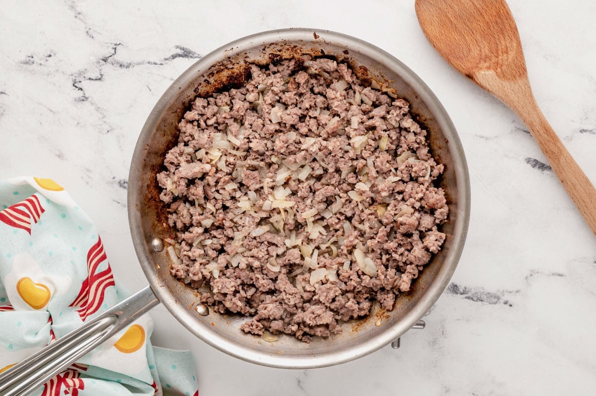 Cooked ground breakfast sausage in a skillet.