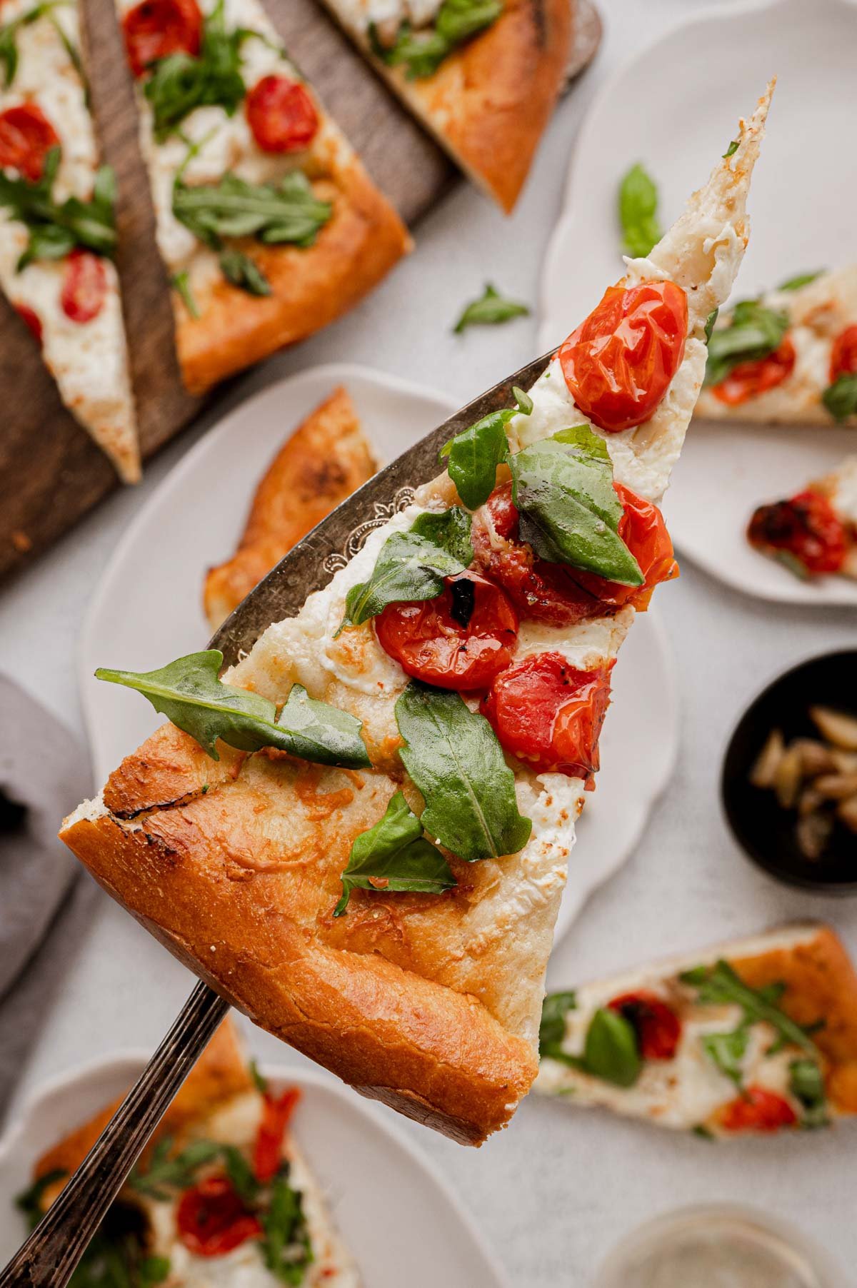 Slice of Burrata pizza.