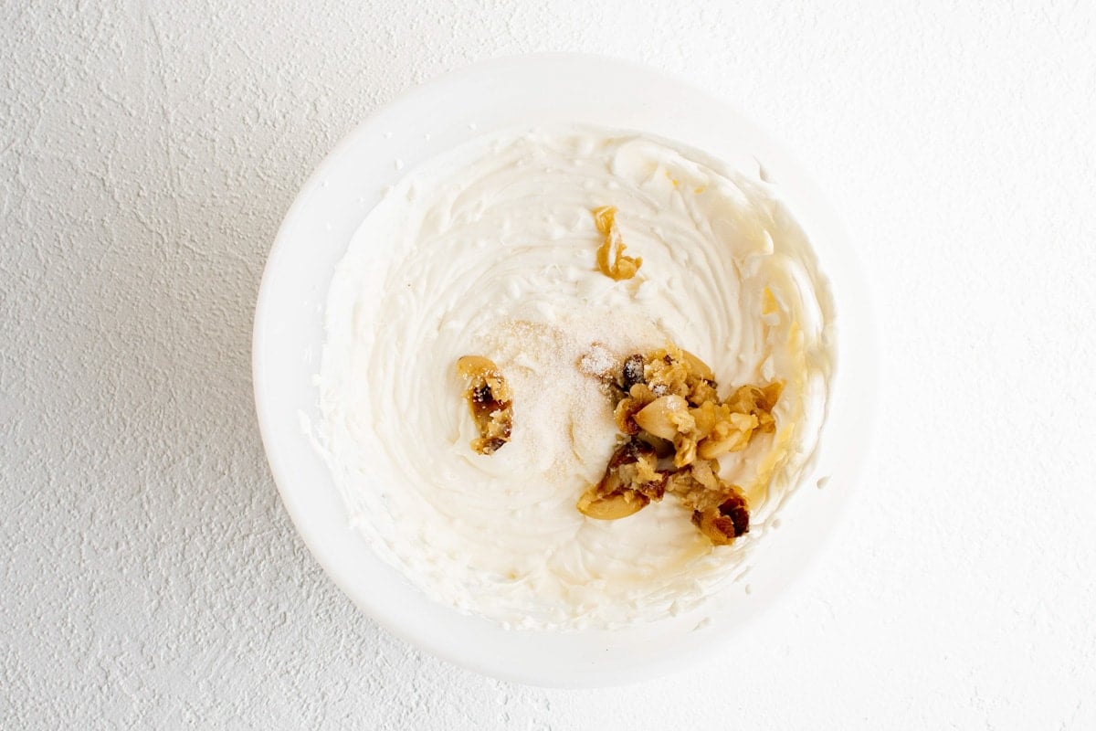 Cream cheese, mayo, sour cream and roasted garlic in a large bowl