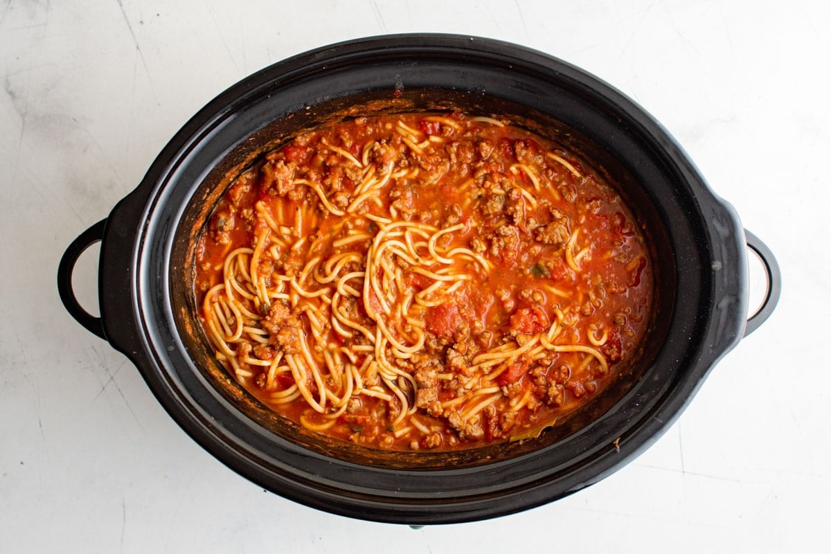 Spaghetti and meat sauce in a slow cooker.
