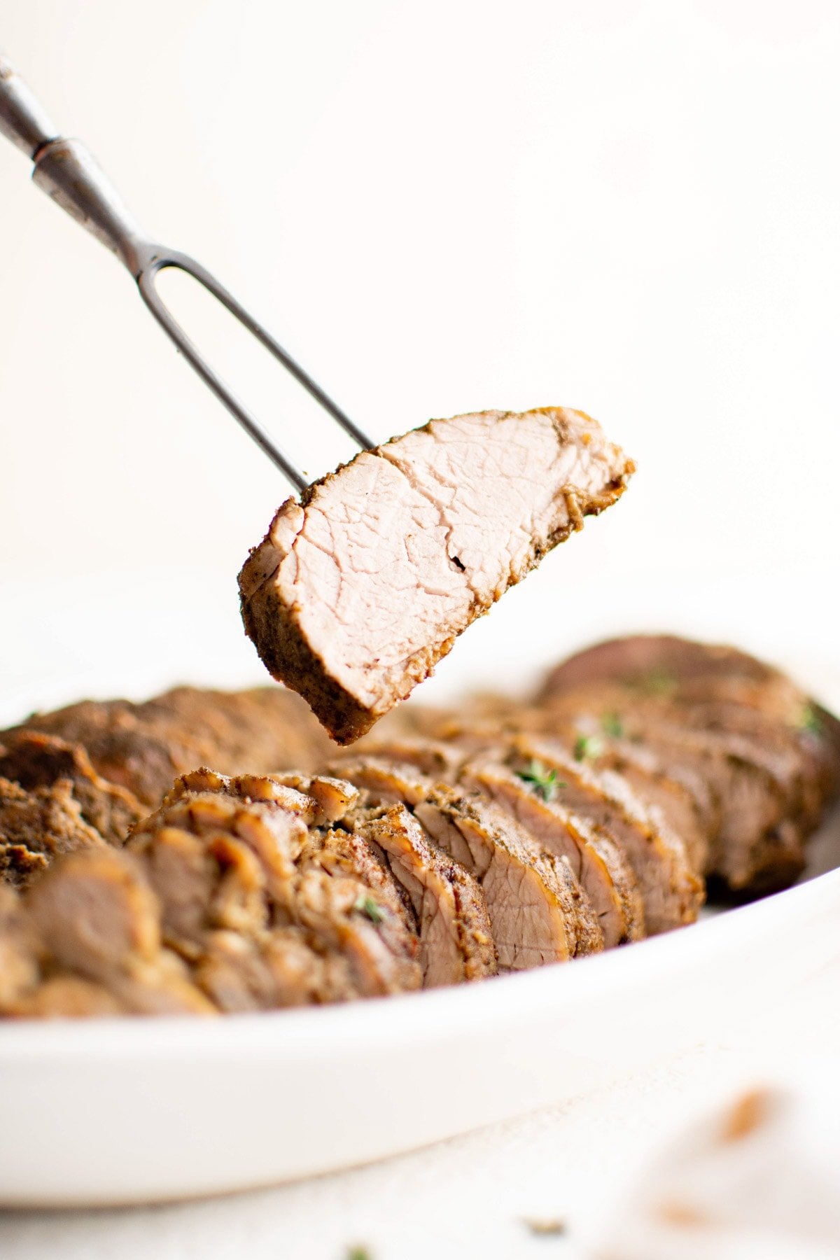 Pan Roasted Pork Tenderloin - Tender, juicy and so flavorful. Ready in under 30 minutes makes it a perfect weeknight dinner!