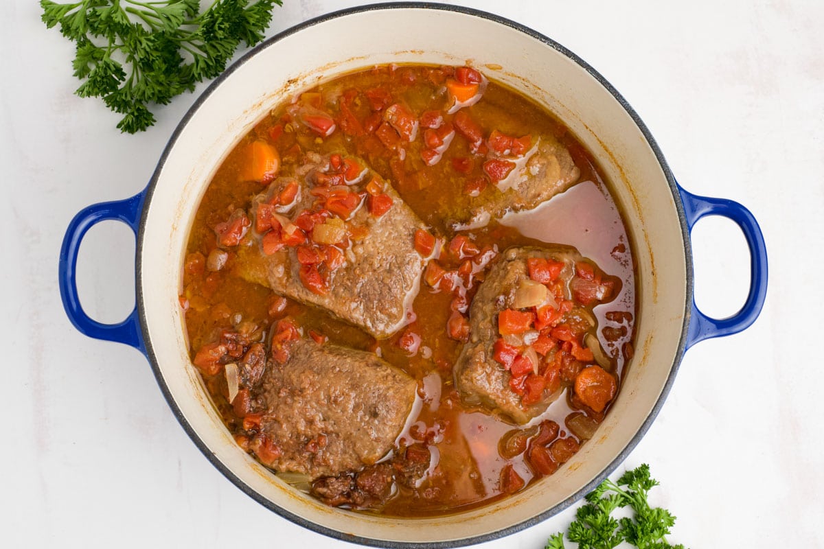 Swiss steaks in a beef tomato broth.