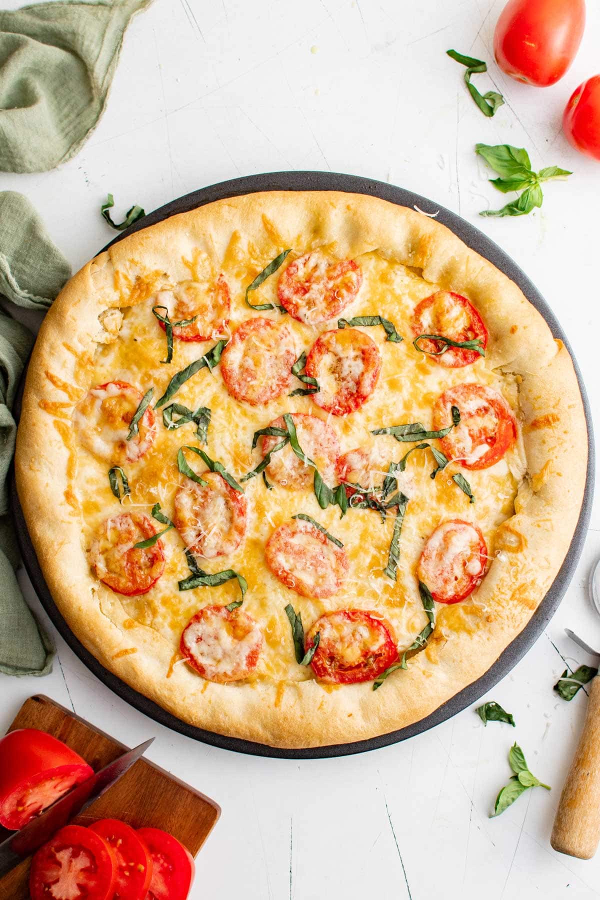 Cheese and Tomato Pizza with basil.