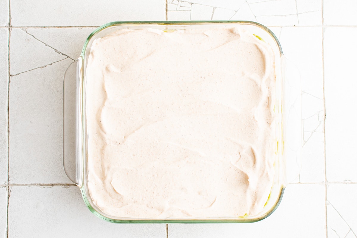 sour cream in a baking dish.