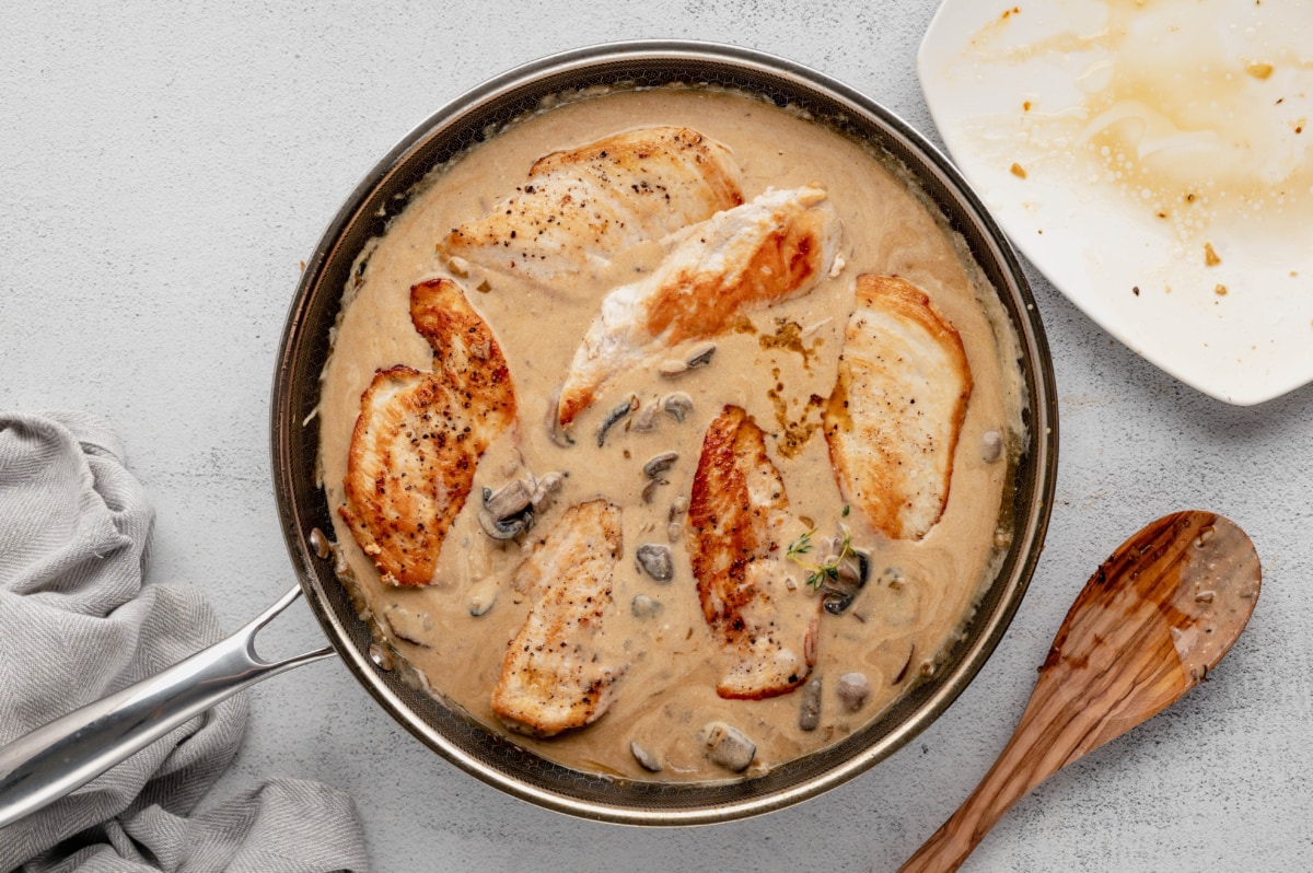 Creamy brown sauce with chicken breasts and mushrooms.