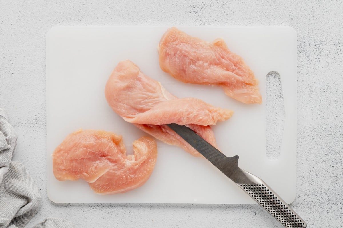 Image show how to butterfly chicken breasts.