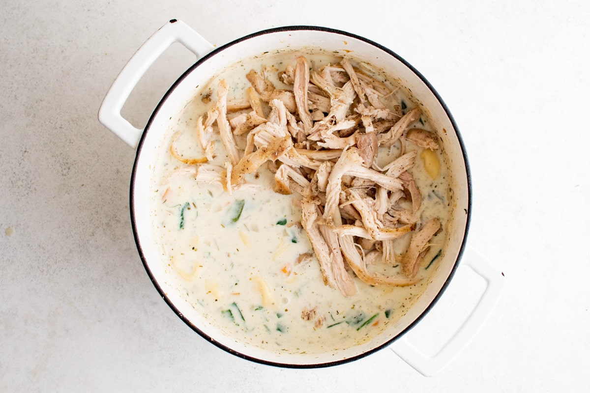 Creamy soup with shredded chicken.