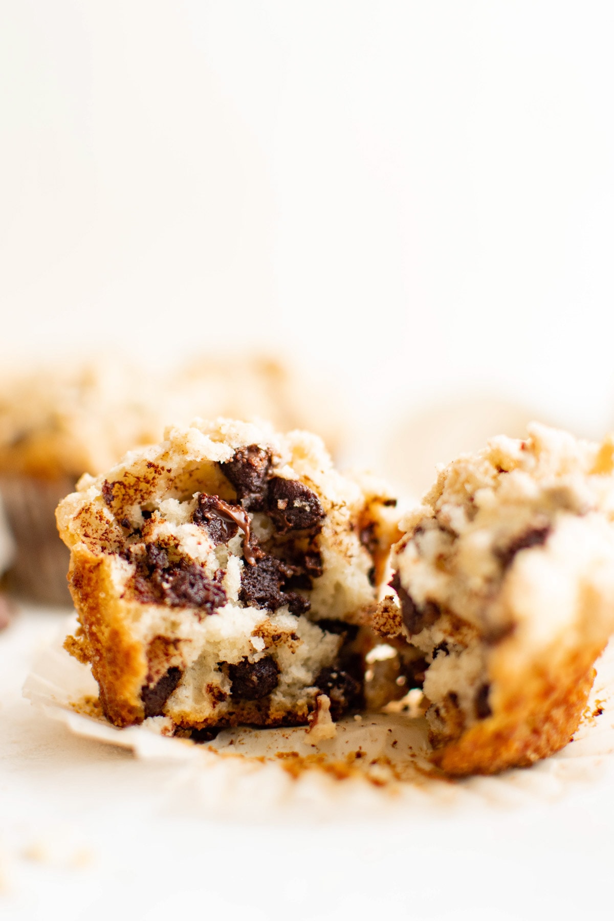 Split open chocolate chip muffin.