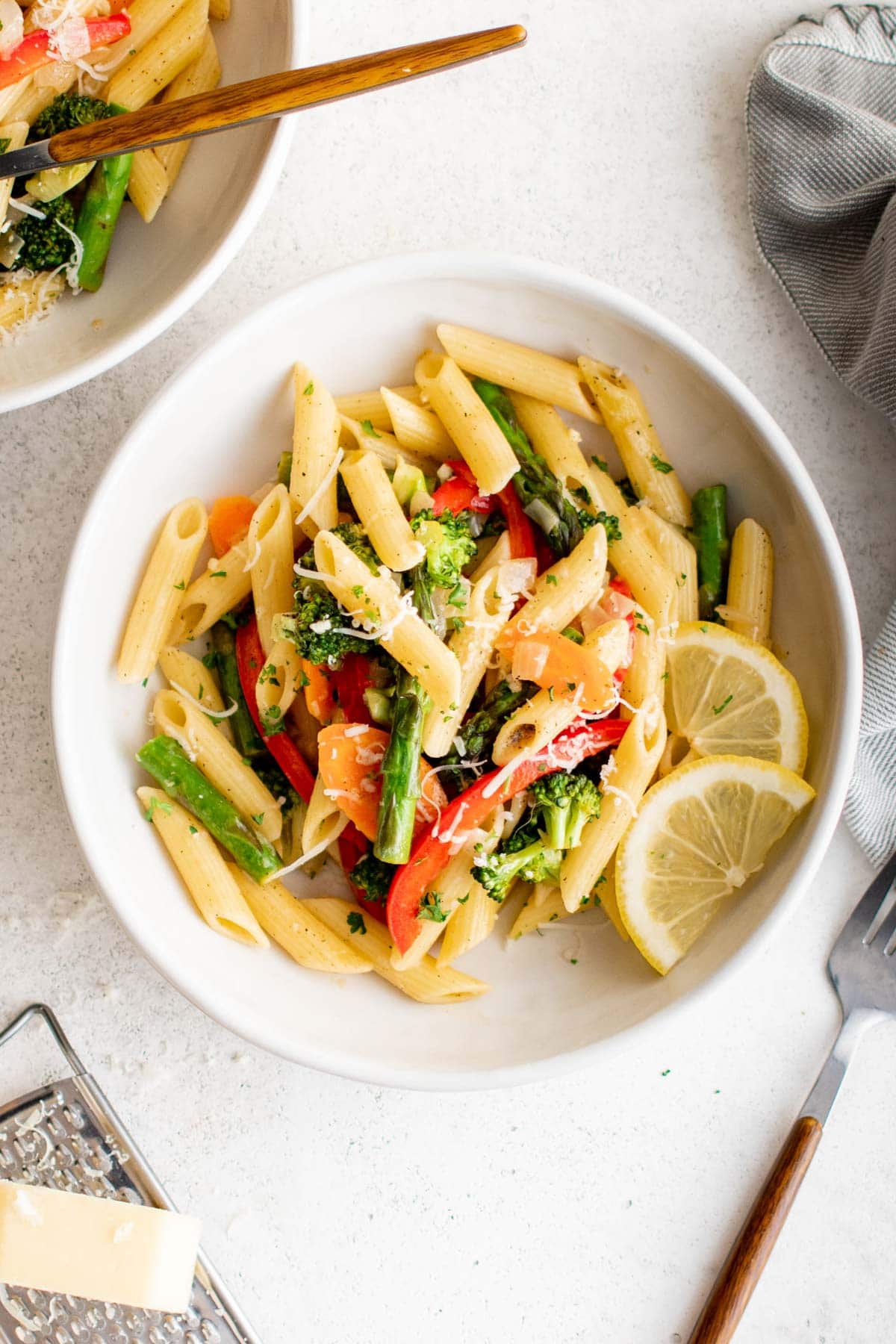 Bowl of pasta with veggies.