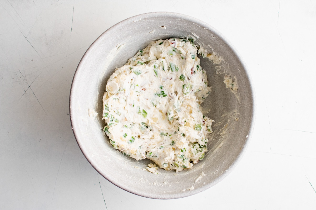 Pineapple cream cheese mixture in a bowl,