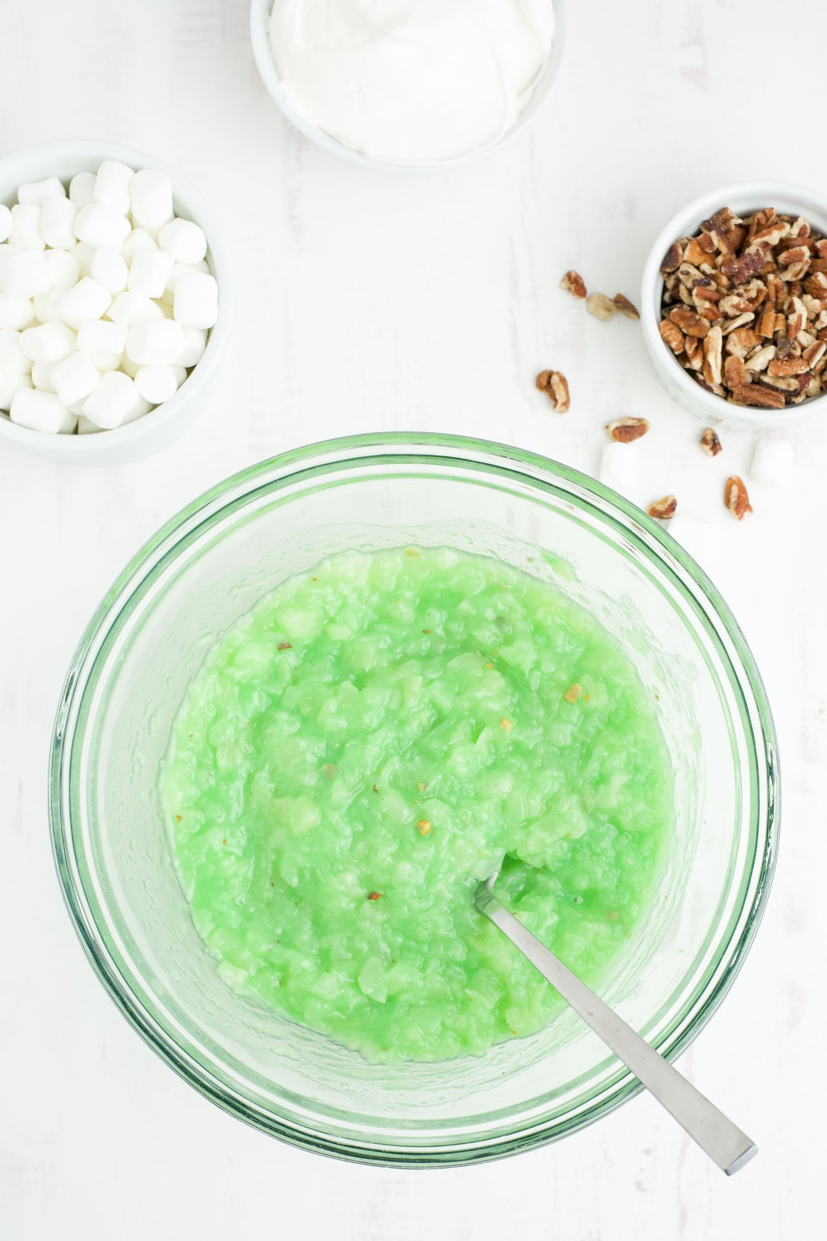 Green pistachio pudding combined with crushed pineapple.