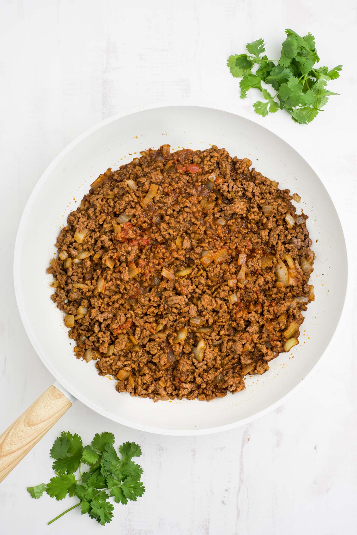 Cooked ground beef taco meat in a skillet.