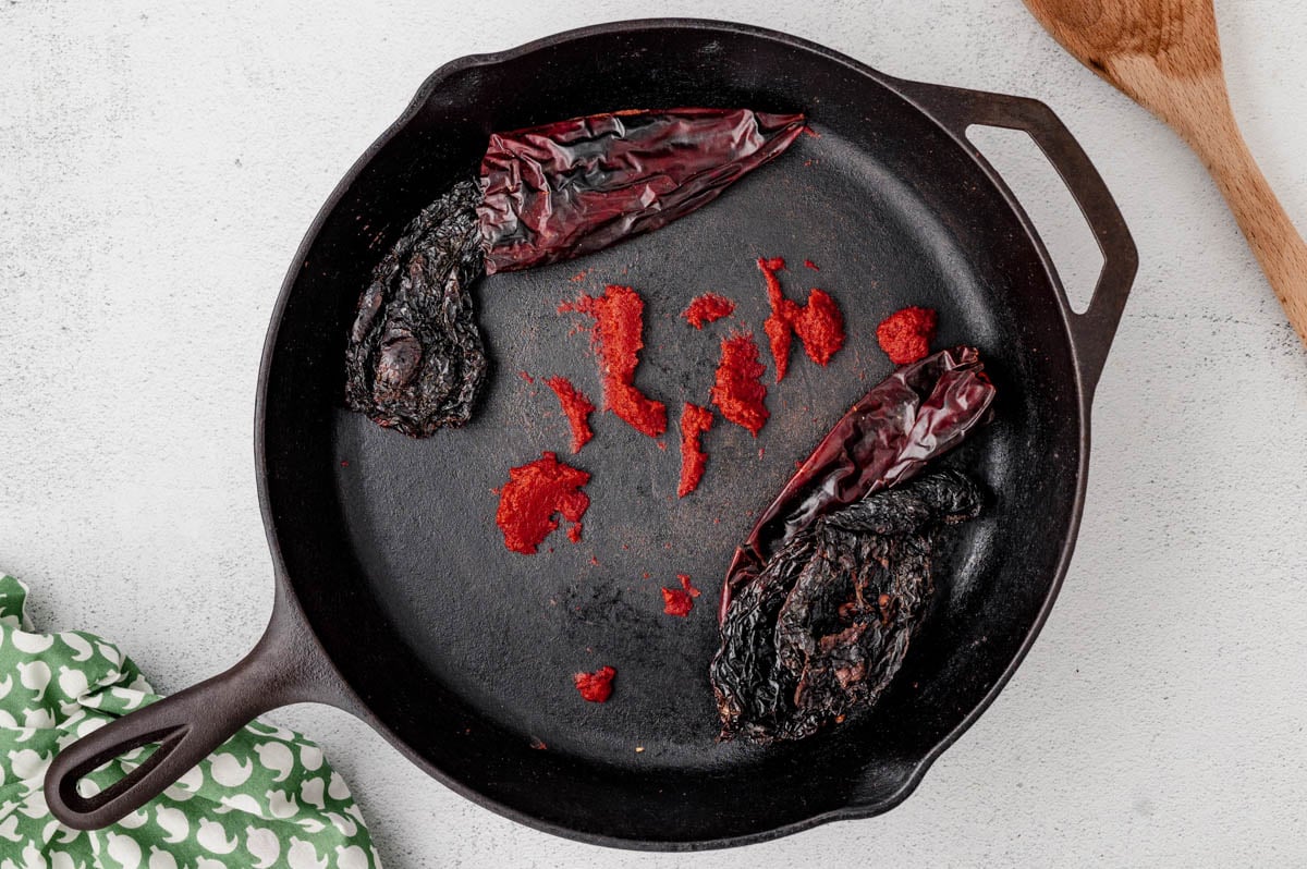 Chiles in a cast iron skillet. 