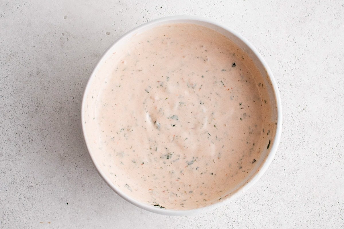 Zesty Salsa Dressing in a white bowl.