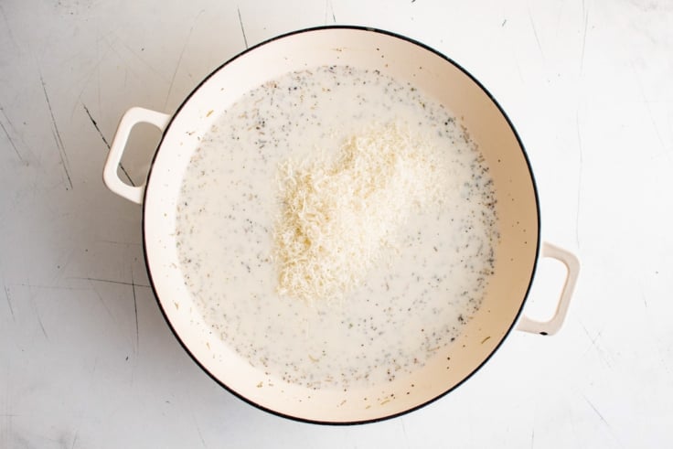 Cream sauce with shredded parmesan cheese.