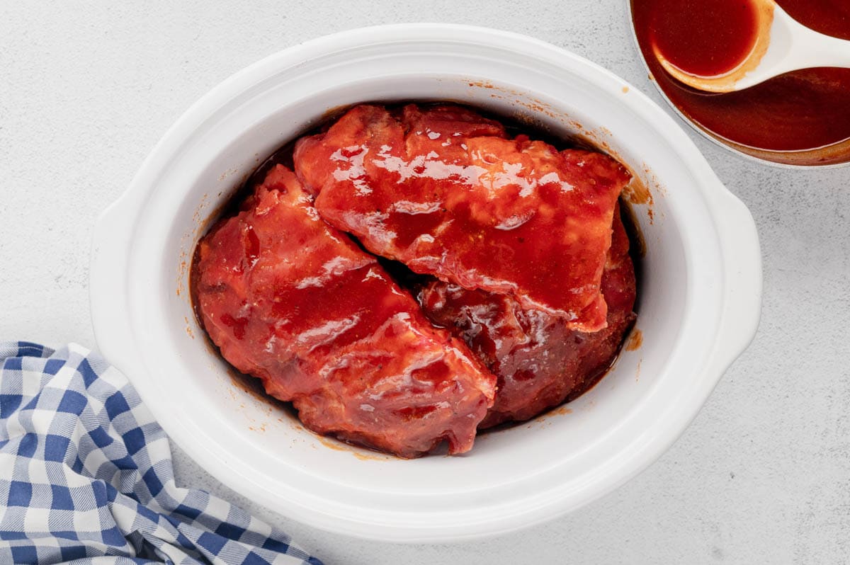 BBQ sauced ribs in a slow cooker.