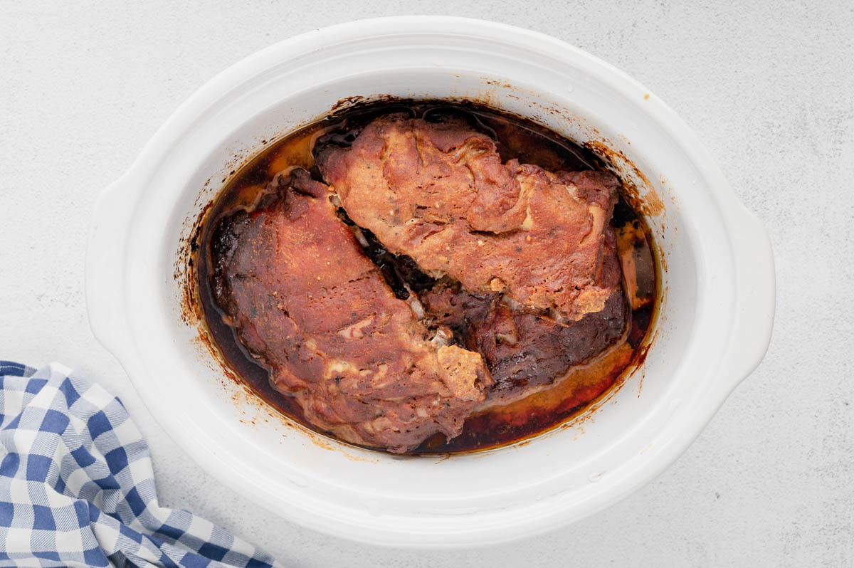 Cooked ribs in a slow cooker.
