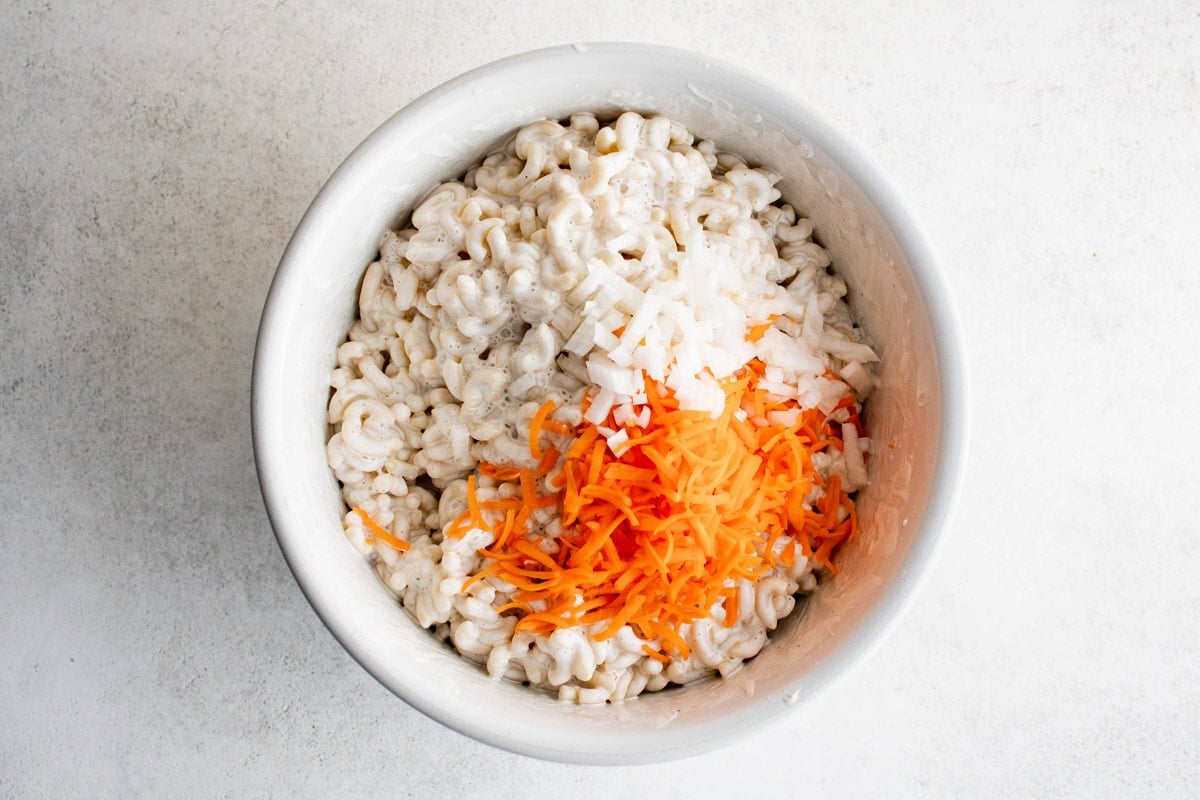 grated carrot and diced onion with creamy macaroni.