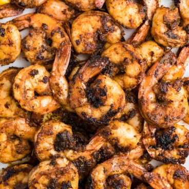 Blackened shrimp in a pile.