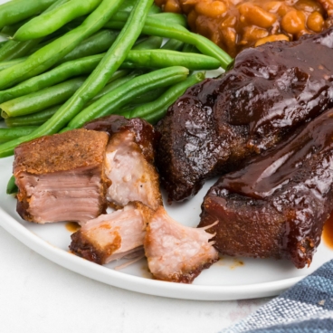 Country style ribs cut on a plate.