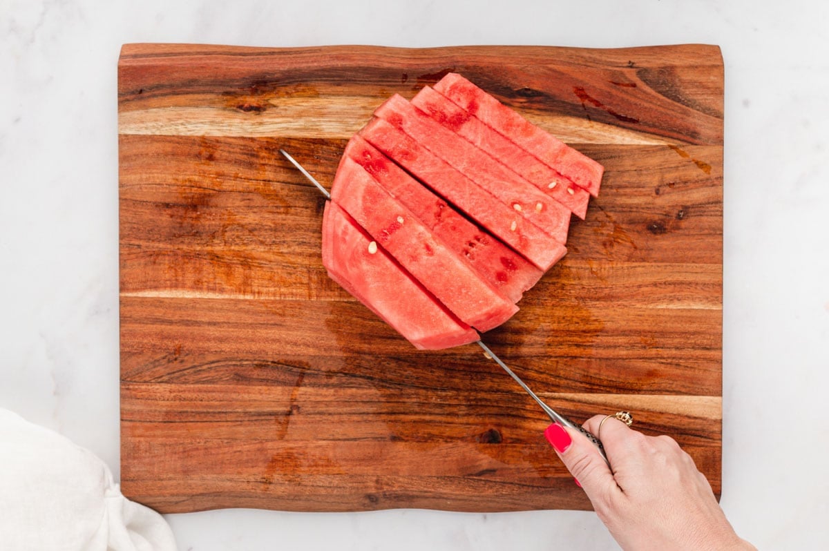 Watermelon slice with no rind and cut into sticks.