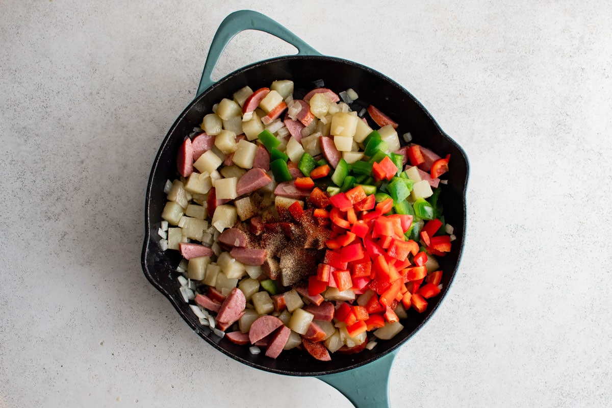 Hash with potatoes, sausage, bell peppers and onions.