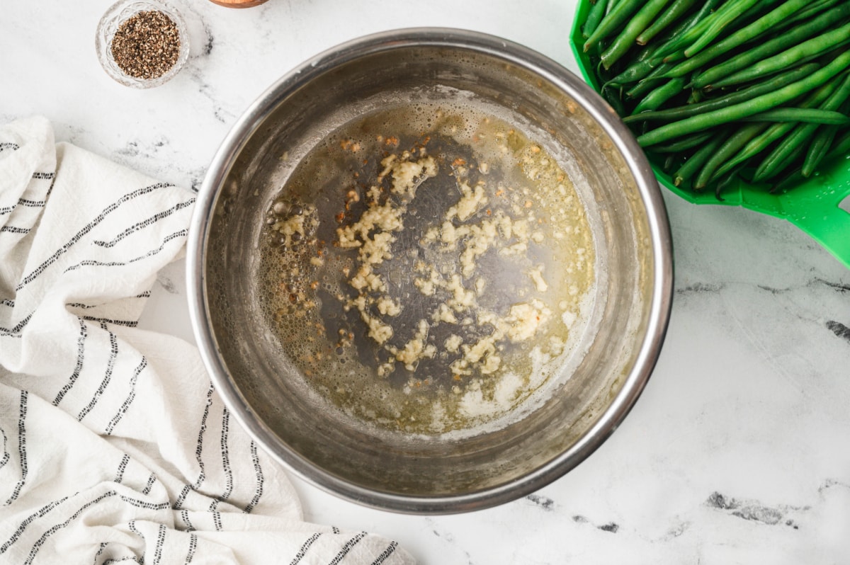 Minced garlic and butter in an instant pot.