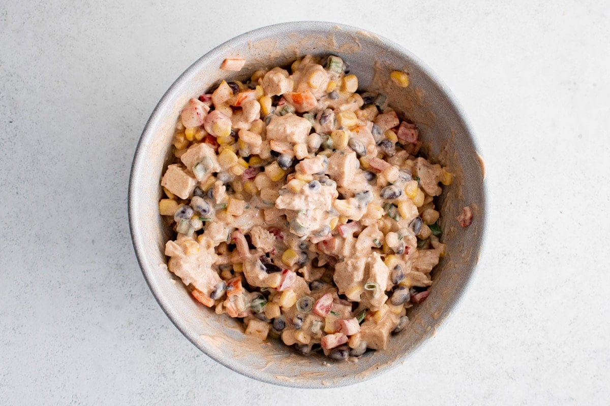 Southwest chicken salad mixed together in a bowl.
