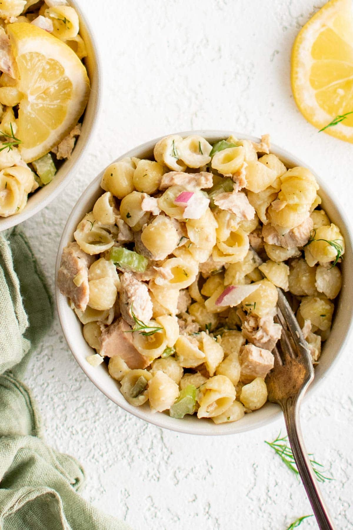 Bowl of tuna pasta salad with a fork.