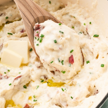 Mashed potatoes on a wooden spoon.