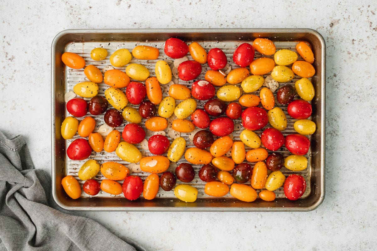 Tomatoes on a baking sheet.