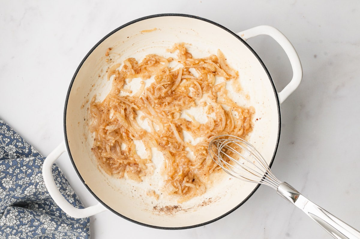 Sauteed onions in a skillet.