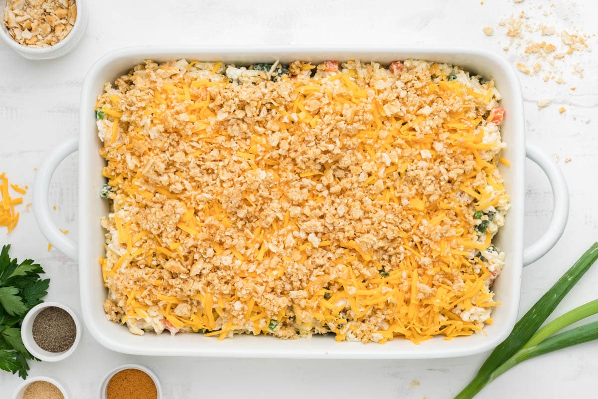 Casserole topped with crushed crackers and cheese. 