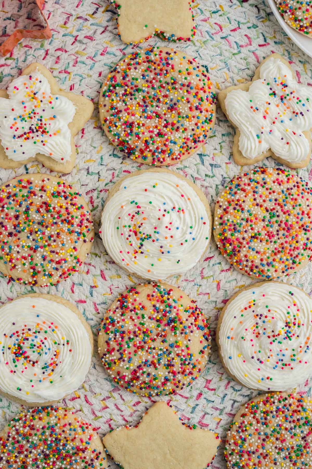 Sugar cookies with frosting and sprinkles.