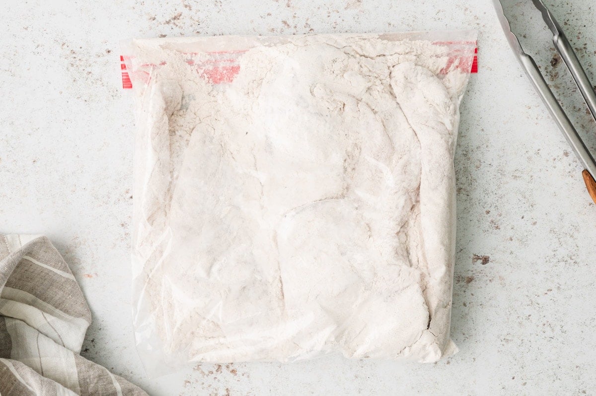 A ziploc bag filled with flour.