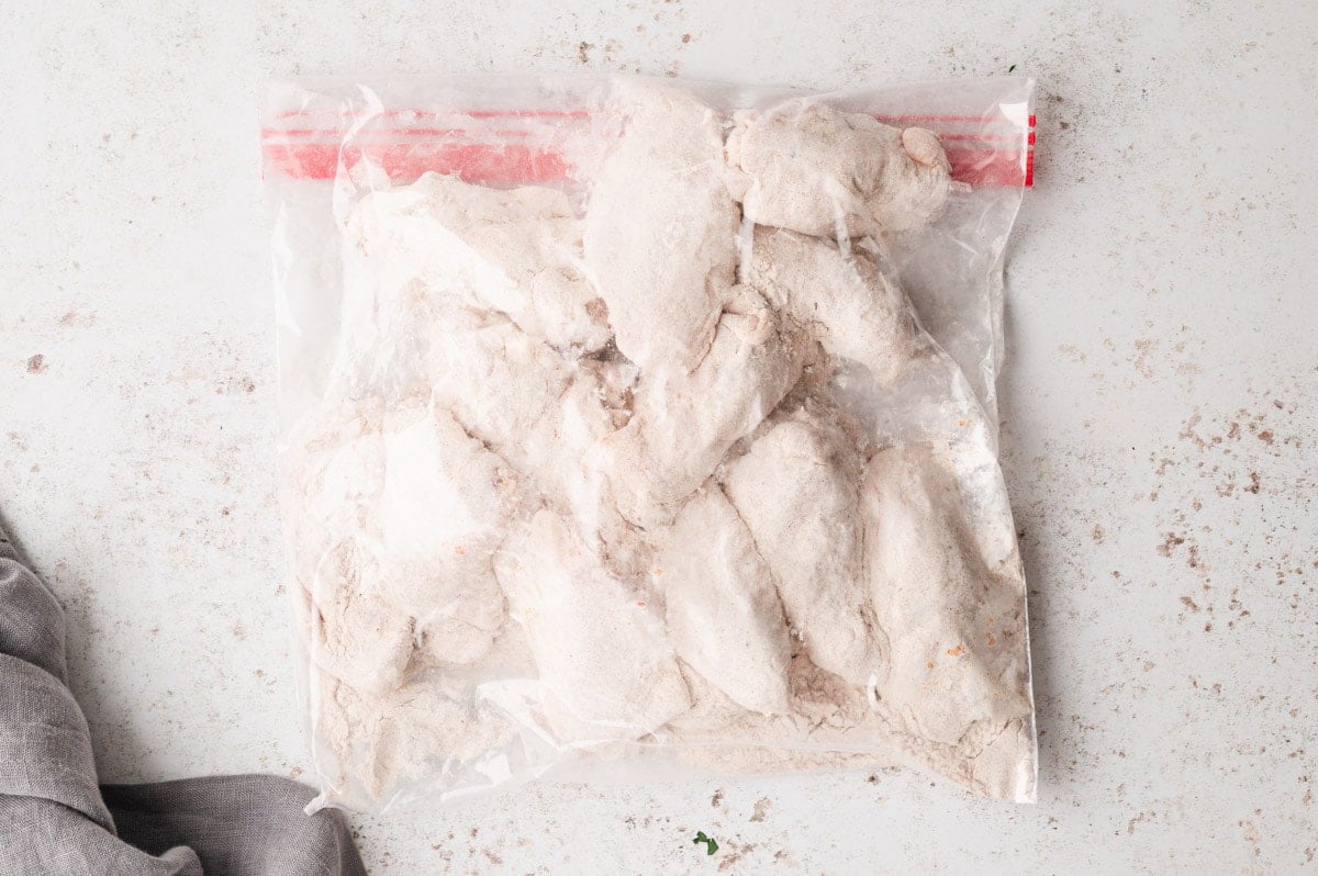 Chicken wings in a plastic bag.
