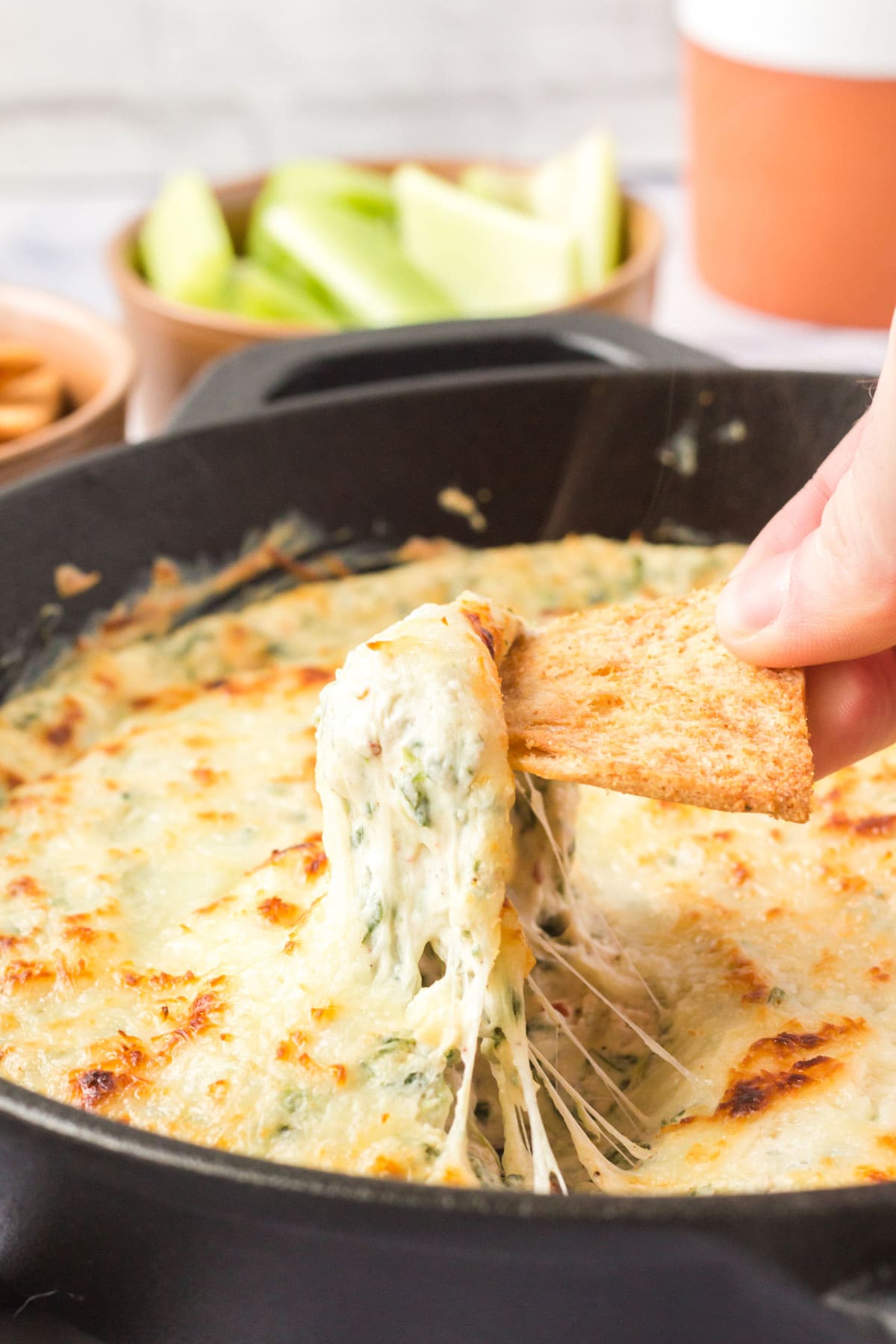 spinach dip serving on a chip