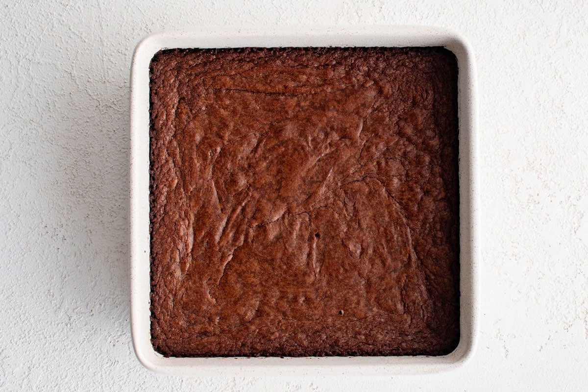 Brownies baked in a square pan.