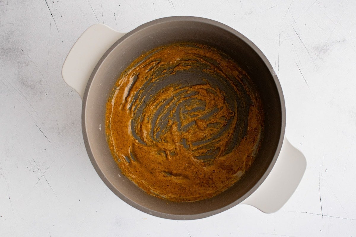 Orange mixture made by mixing butter and flour in a saucepan.