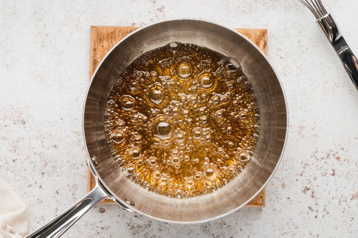 Boiling liquid in a skillet.