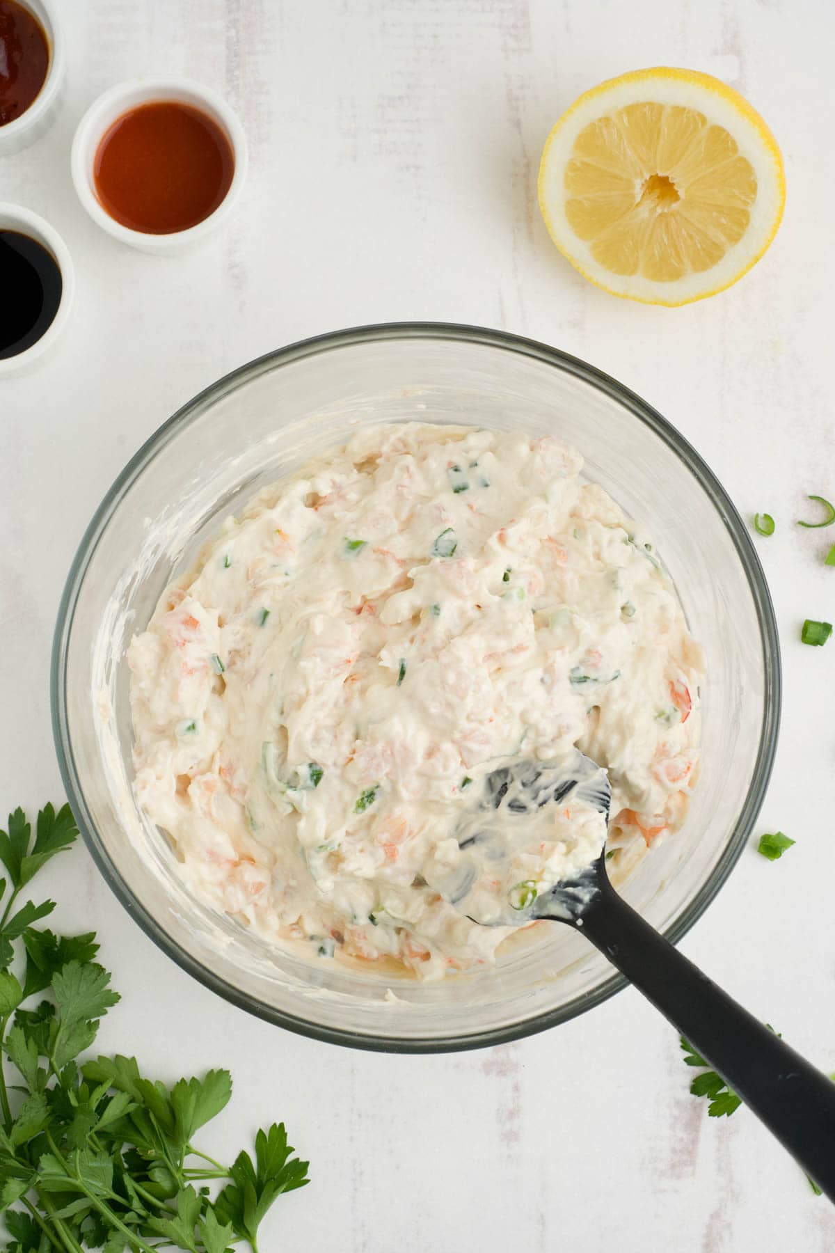 Blended cream cheese dip with chopped shrimp.