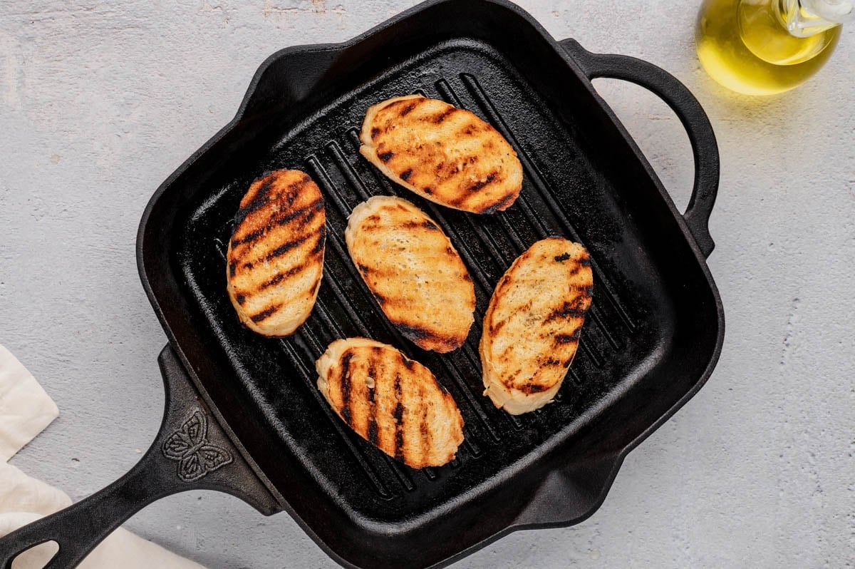 Crostini on a stovetop grill.