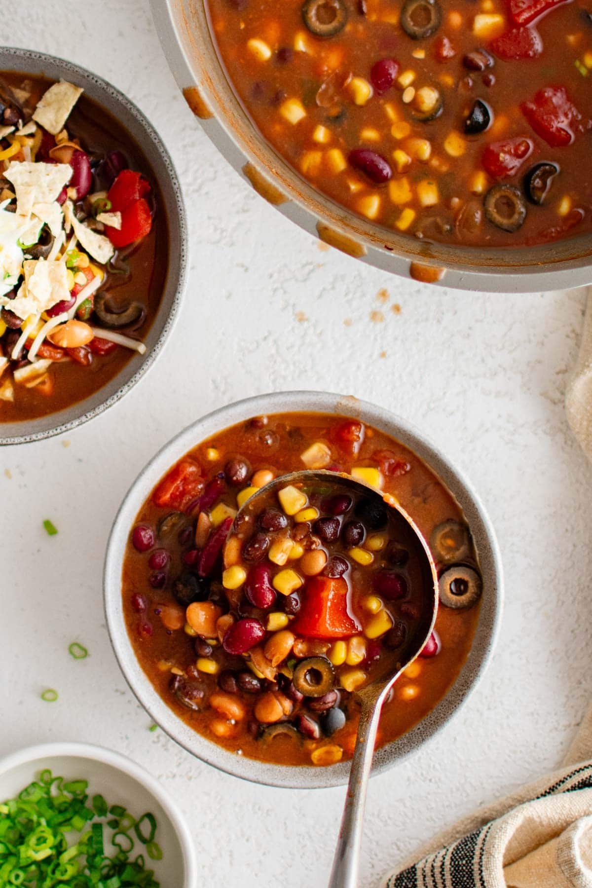 soup ladle, taco soup in a bowl.