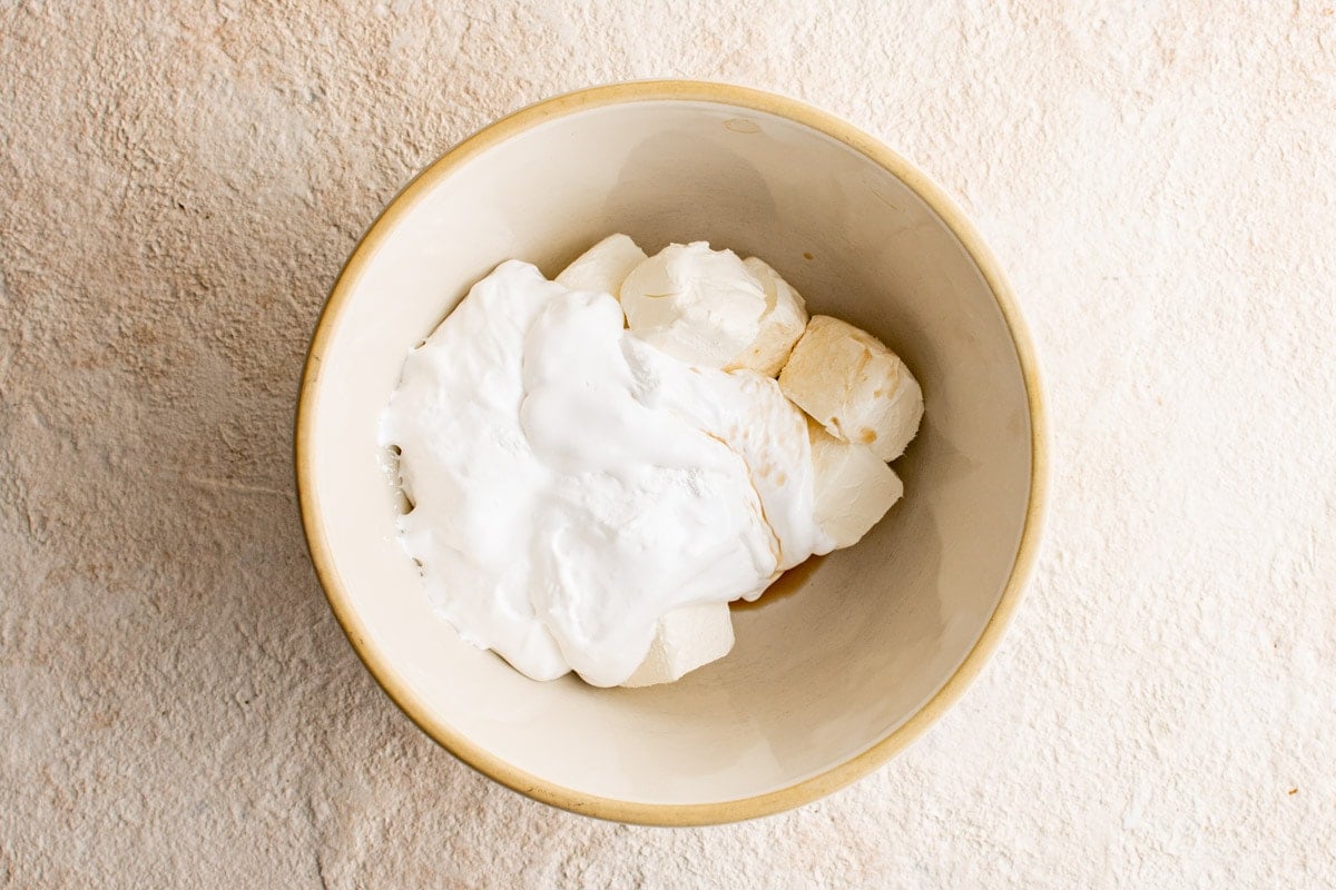 cream cheese in a large mixing bowl