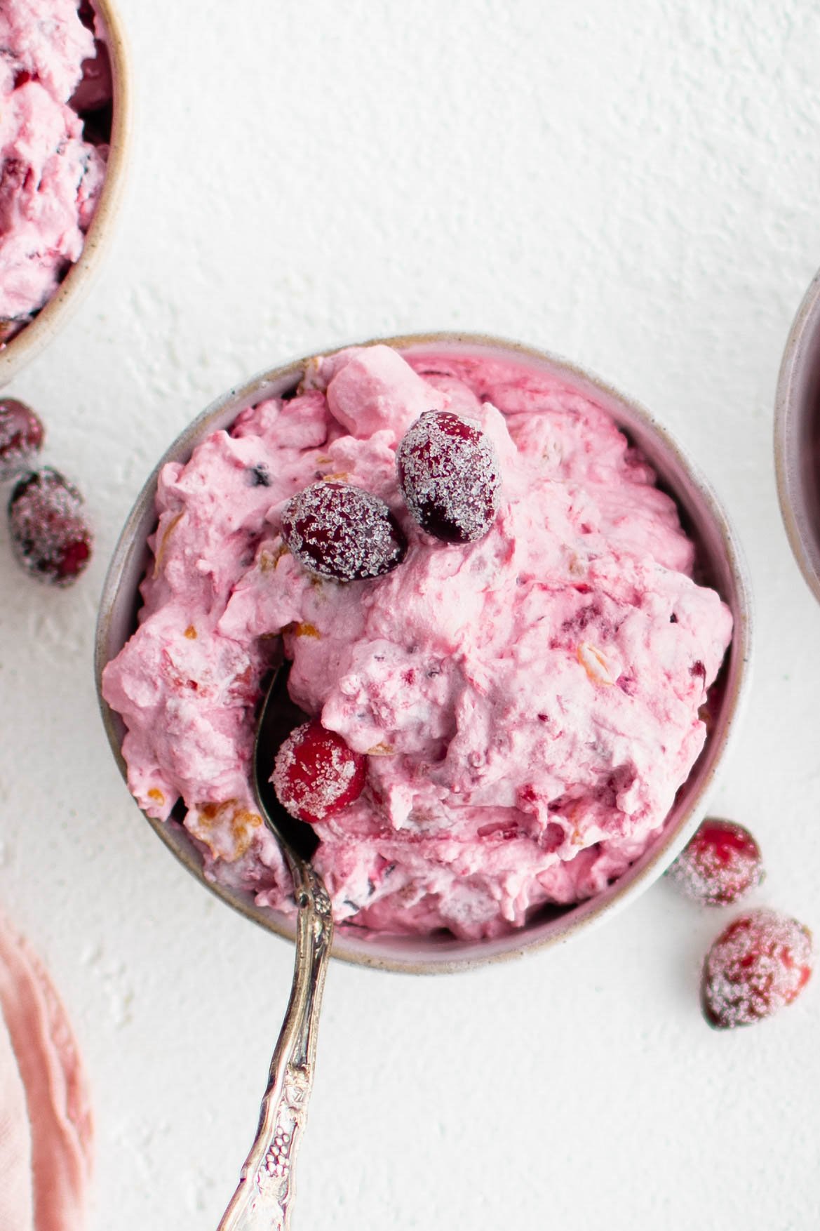 Small bowl with a serving of cranberry fluff.