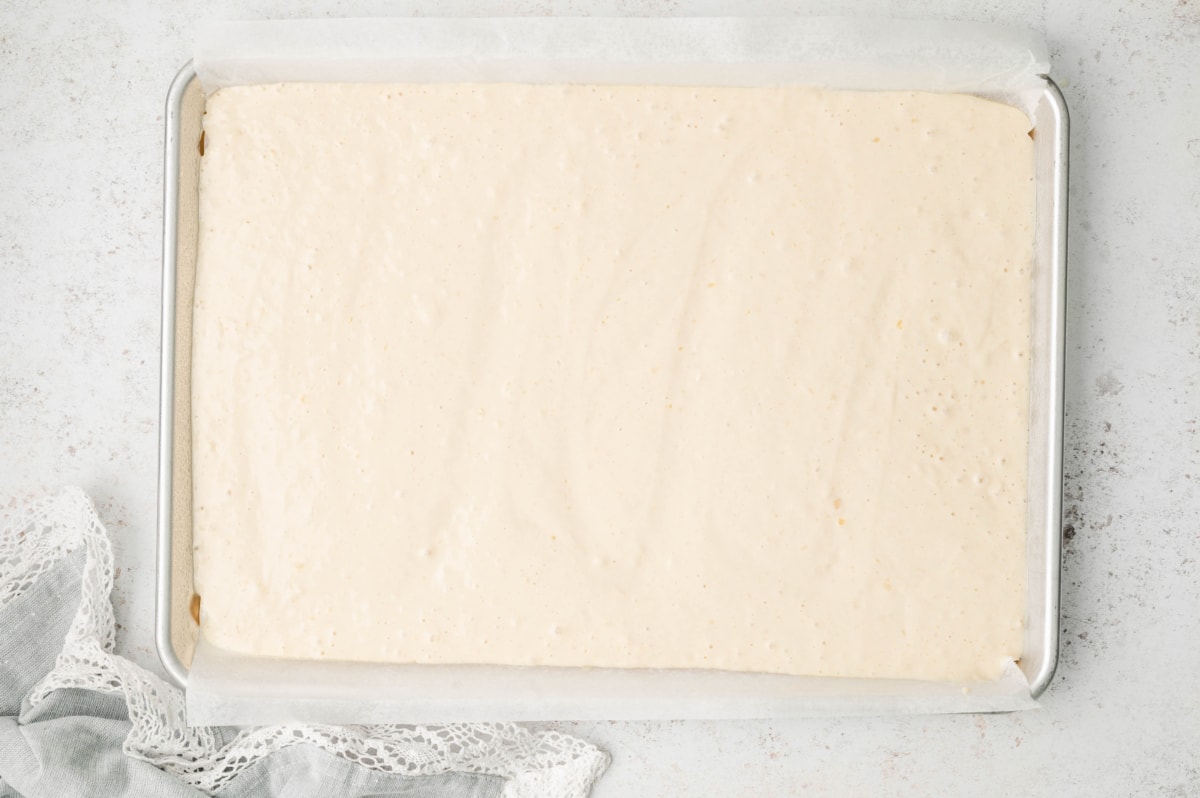 Pancake batter poured in a sheet pan.