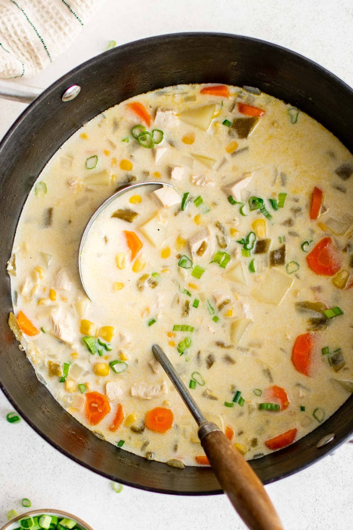 Big pot of creamy chicken and vegetable soup.